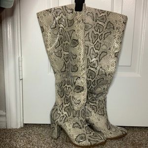 Express snake skin calf boots